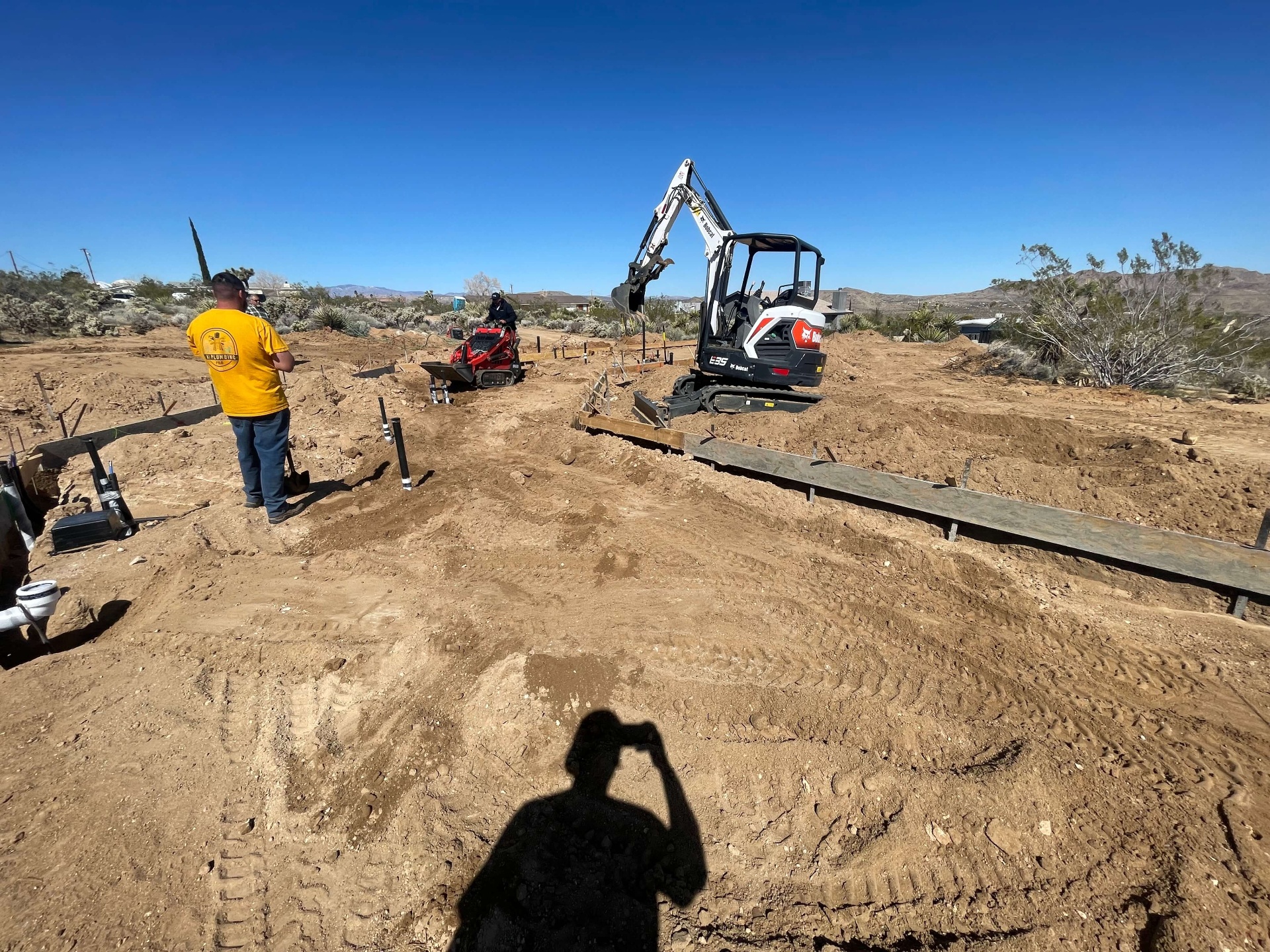 Job site crew with excavator in Yucca Valley